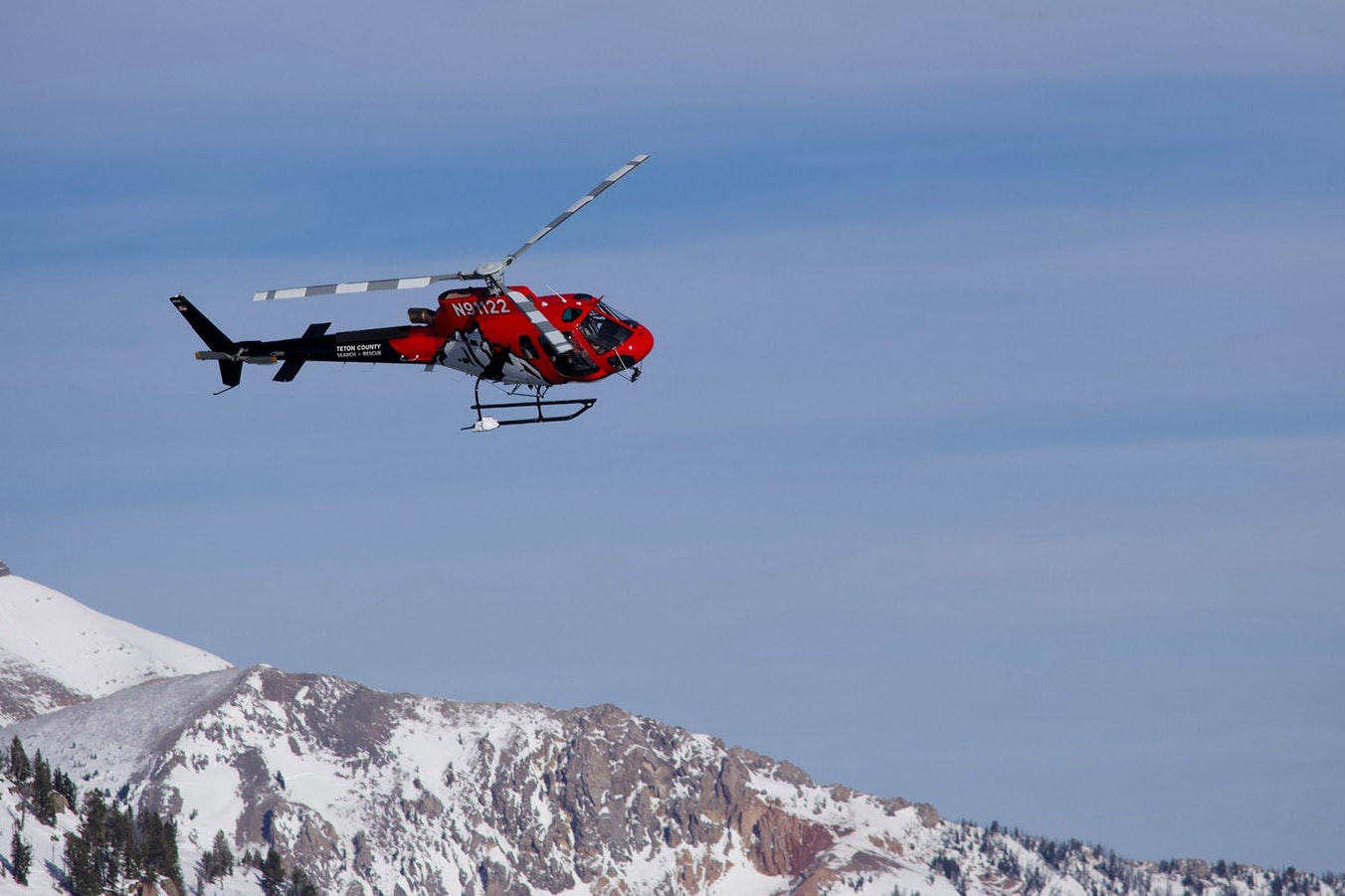 A Teton County Search and Rescue helicopter on its way to Prater Canyon to retrieve a skier caught in an avalanche.