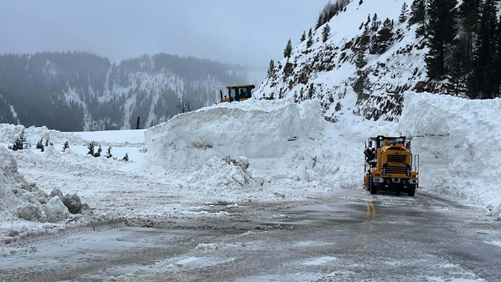 Teton Pass was closed all day Monday as the Wyoming Department of Transportation used bulldozers to clear a wall of wet, heavy snow 30 feet tall and 500 feet long from Highway 22. Officials hope to have the pass open again by Tuesday afternoon.