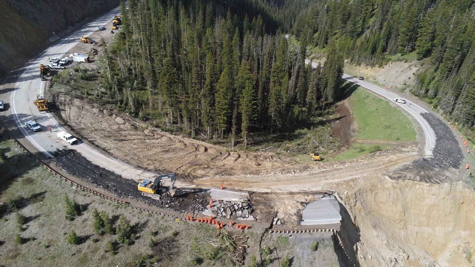 Work is underway for a detour route just inside the original road curve.