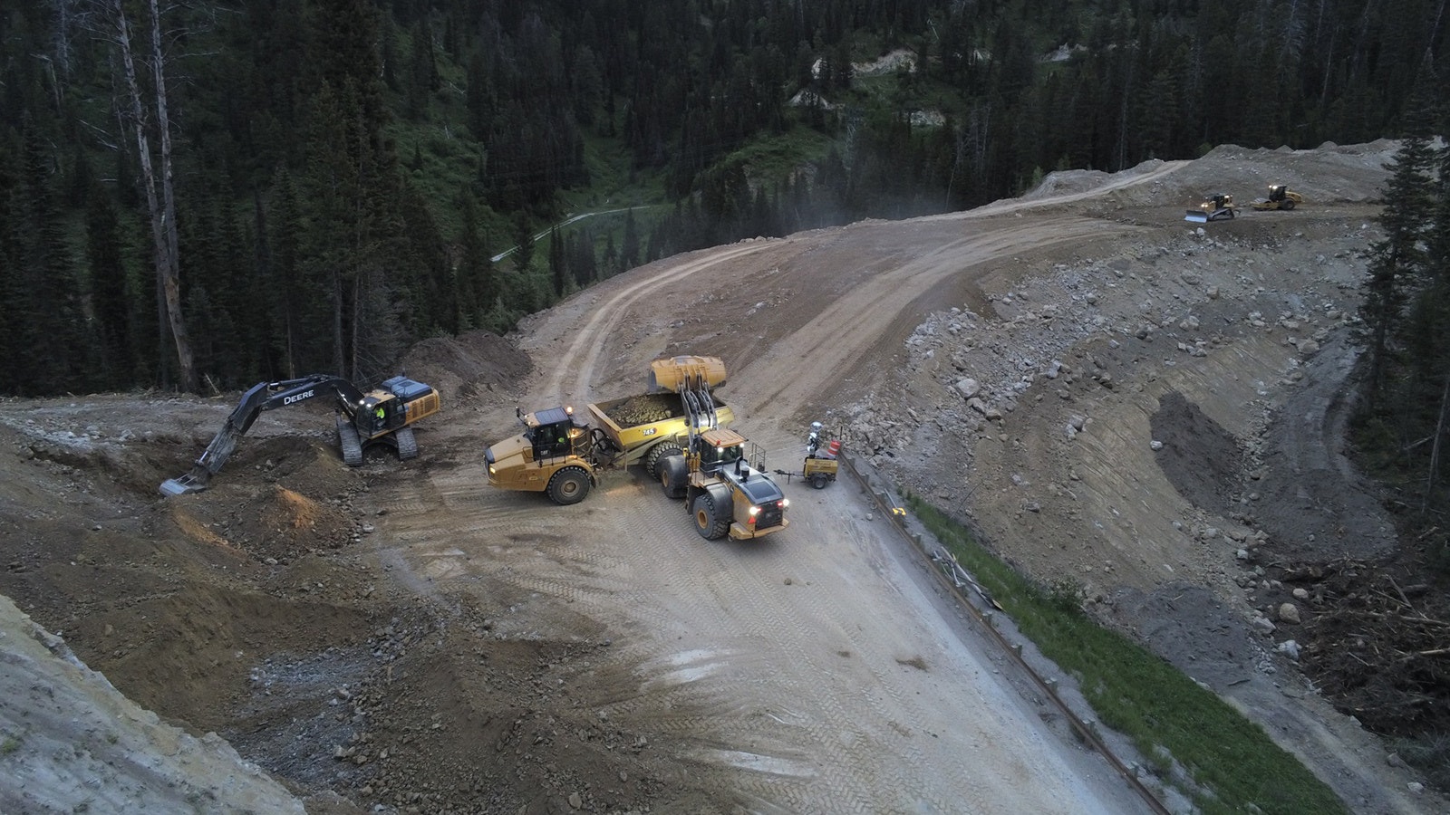 Photos from a drone show the progress crews have made working around the clock to build a detour for a catastrophic failure of Highway 22 on Teton Pass.