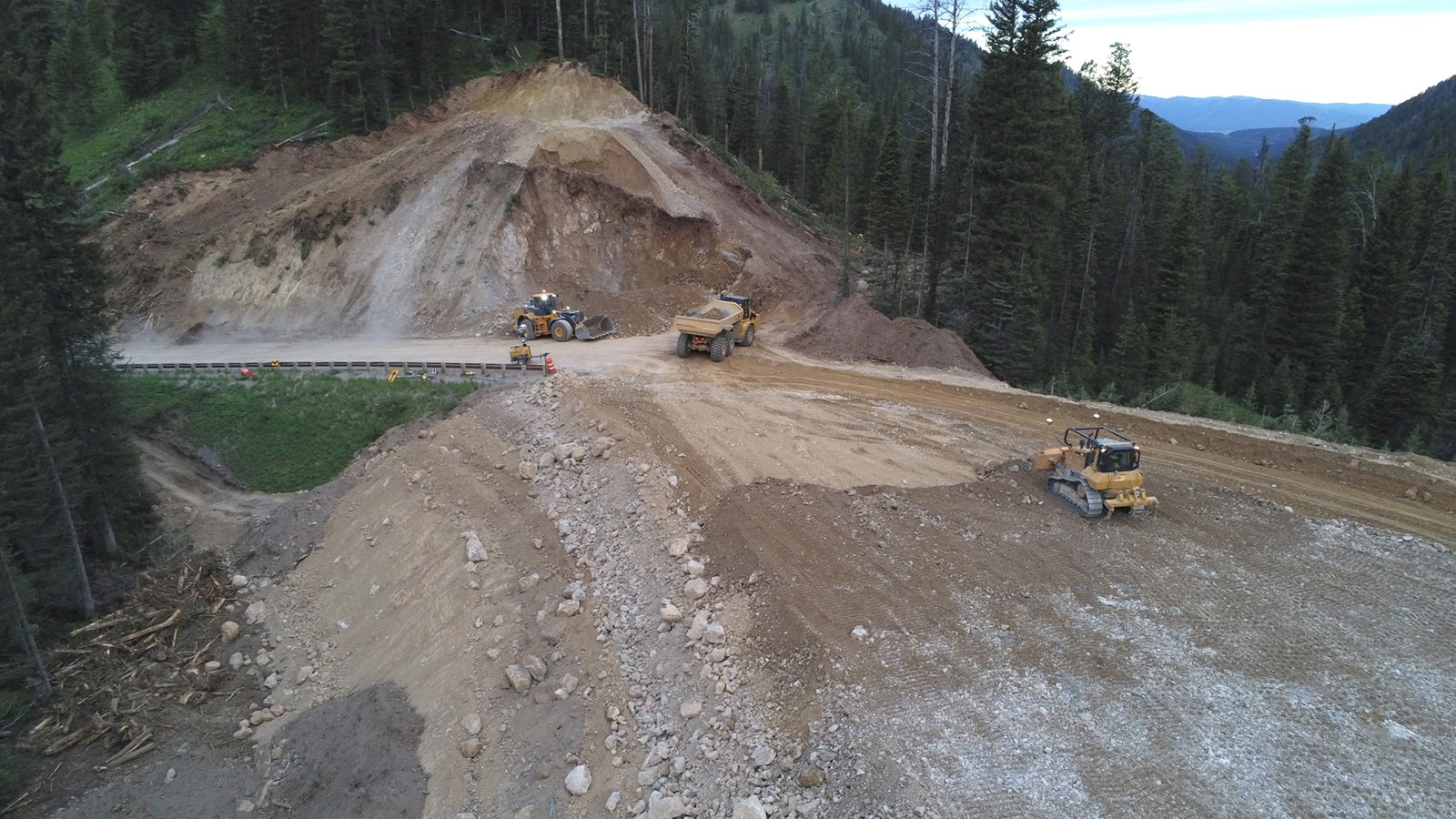 Photos from a drone show the progress crews have made working around the clock to build a detour for a catastrophic failure of Highway 22 on Teton Pass.