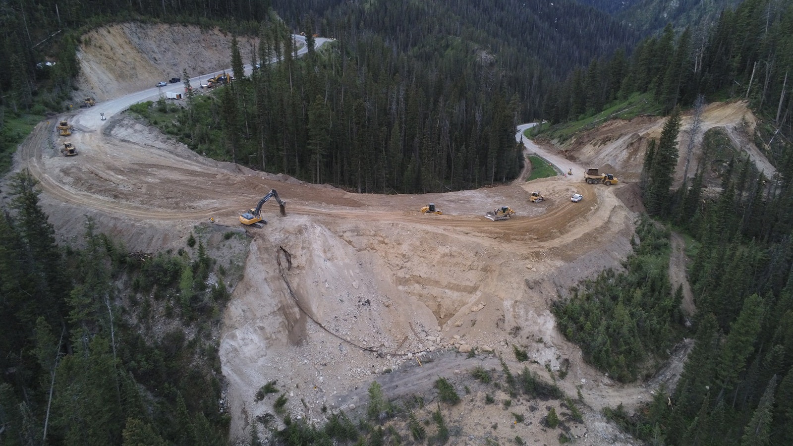 Photos from a drone show the progress crews have made working around the clock to build a detour for a catastrophic failure of Highway 22 on Teton Pass.