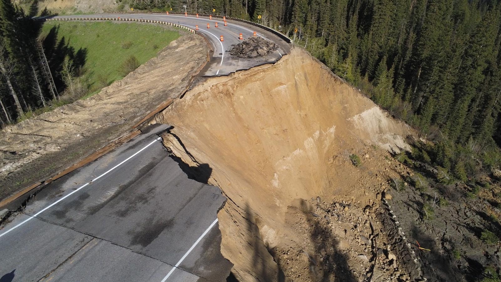 View from a drone of the collapse of a secton of Teton Pass along Wyoming Highway 22.