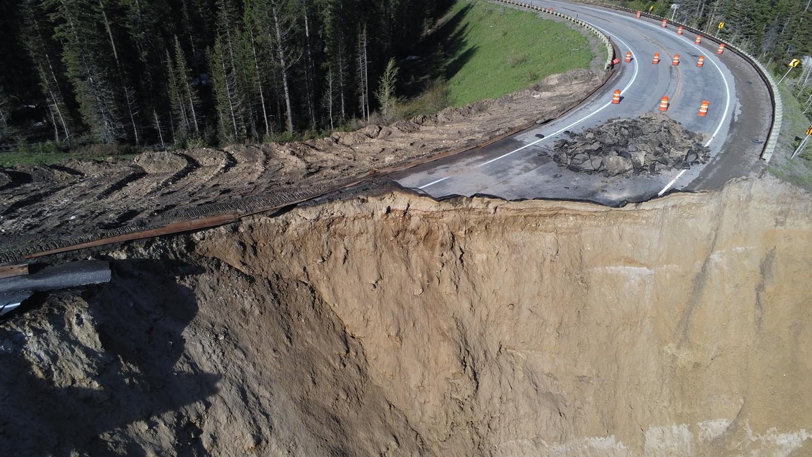 View from a drone of the collapse of a secton of Teton Pass along Wyoming Highway 22.