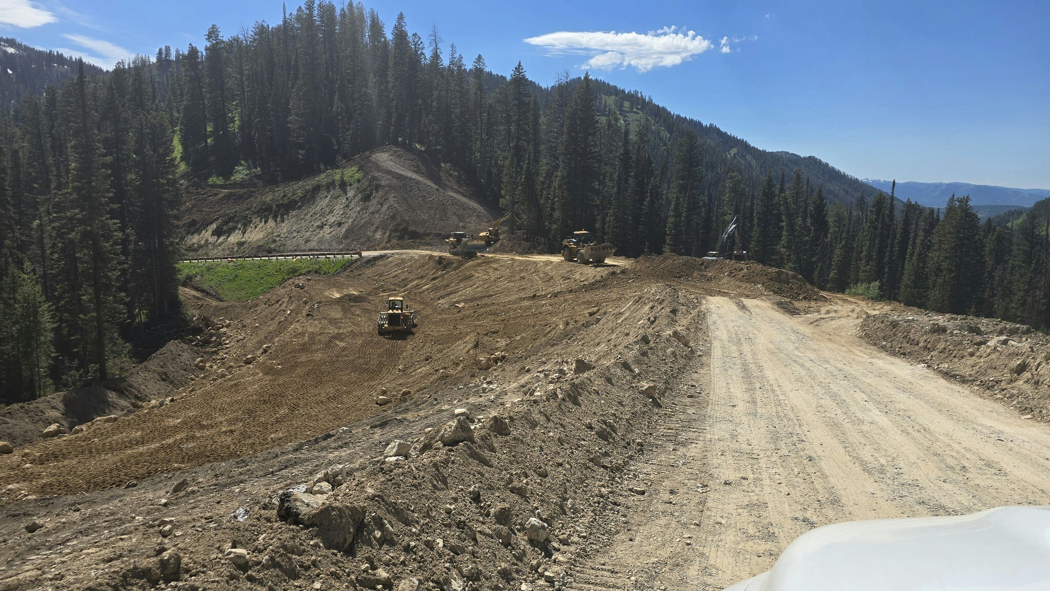 A view looking down the new Teton Pass route being built inside the old one.
