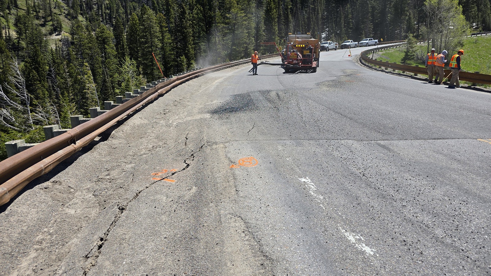 Large cracks appeared on Wyoming Highway 22 over Teton Pass on Thursday, prompting it to close for several hours.