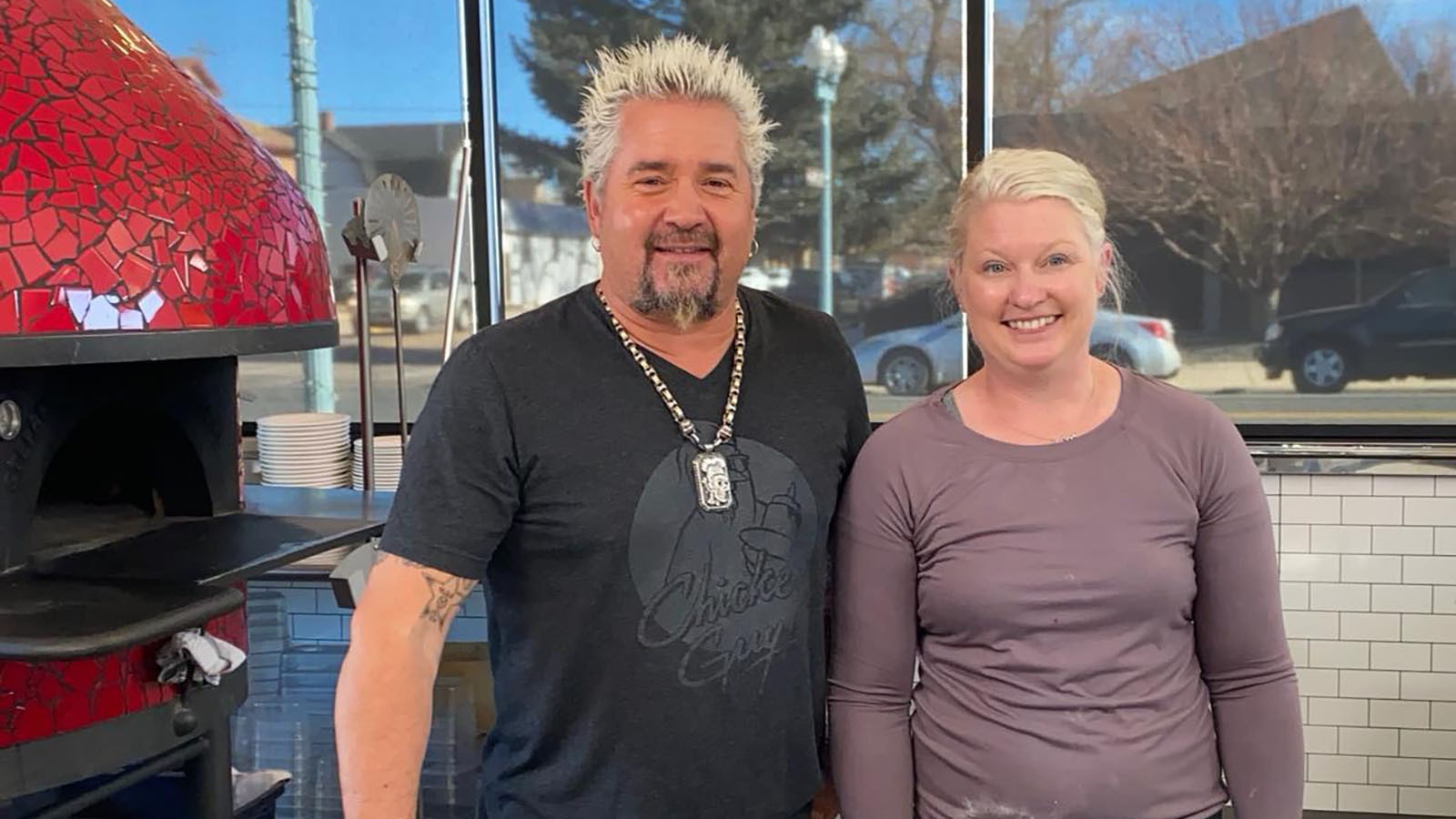 Food Network star Guy Fieri with The Alibi owner and chef Kerri Smith.