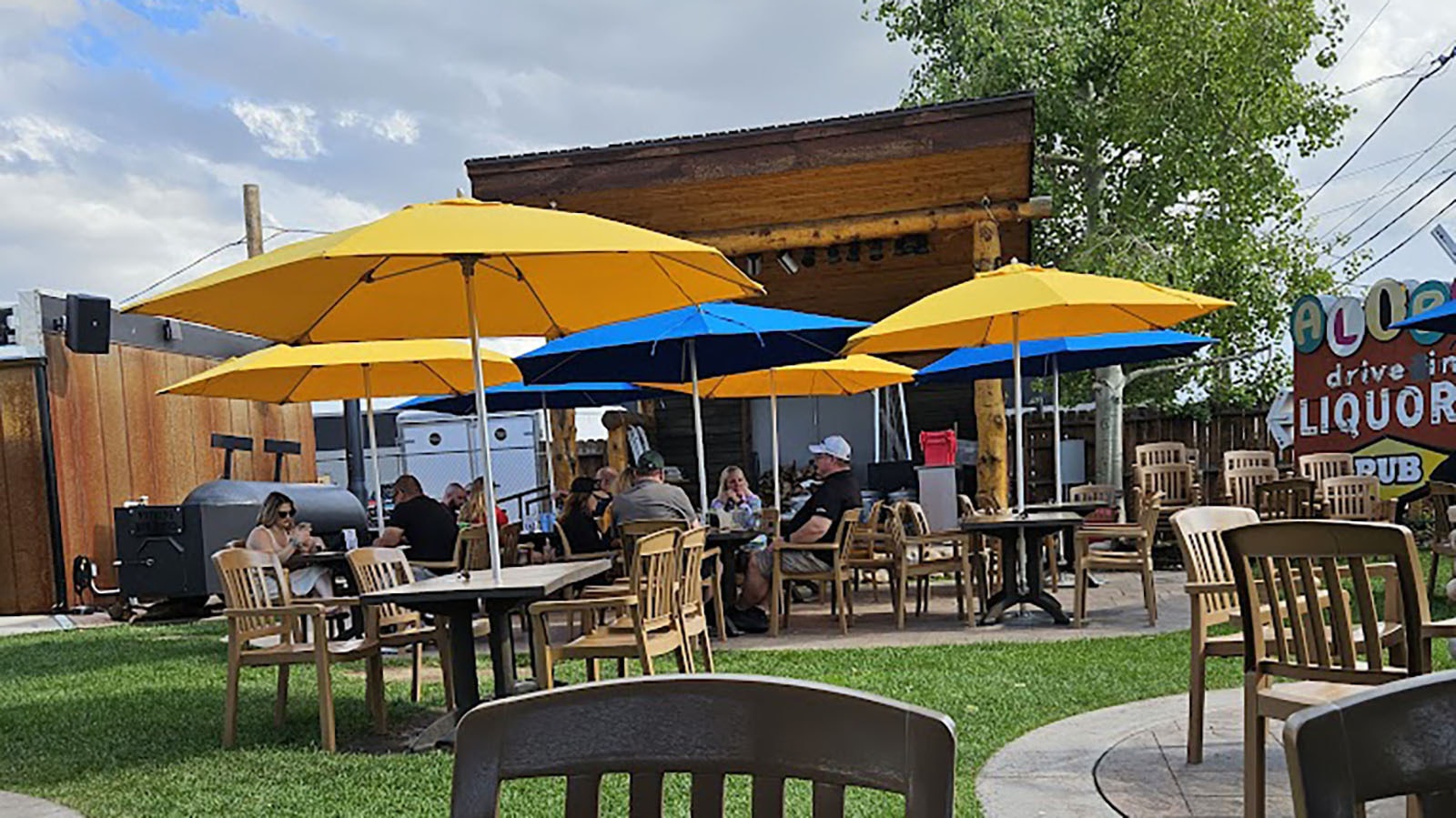 The backyard at The Alibi is a great place during summers, and the old Alibi liquor and pub sign is there.