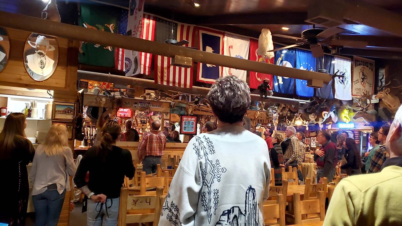 Everyone in the Bunkhouse stops whatever they're doing to sing along with "The Star Spangled Banner."