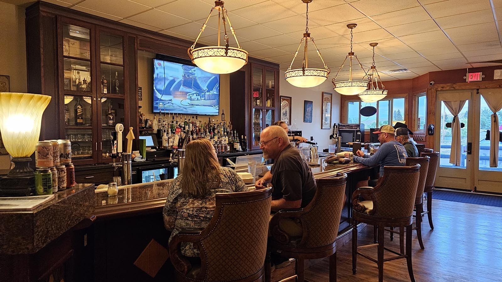 The bar quickly fills up at The Divide Restaurant & Lounge in Encampment.