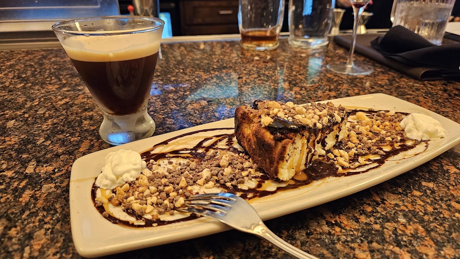 An espresso martini with a turtle-style cheesecake and so many nuts it's nutty in the crazy sense of the word.