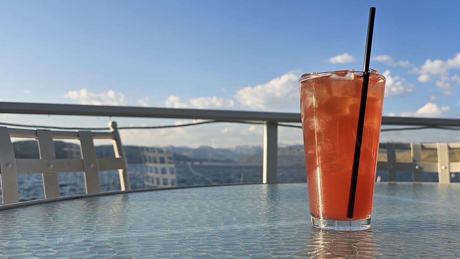 The Huckleberry Tea is lovely against the bright blue sky and lake. It tastes just as good as it looks.