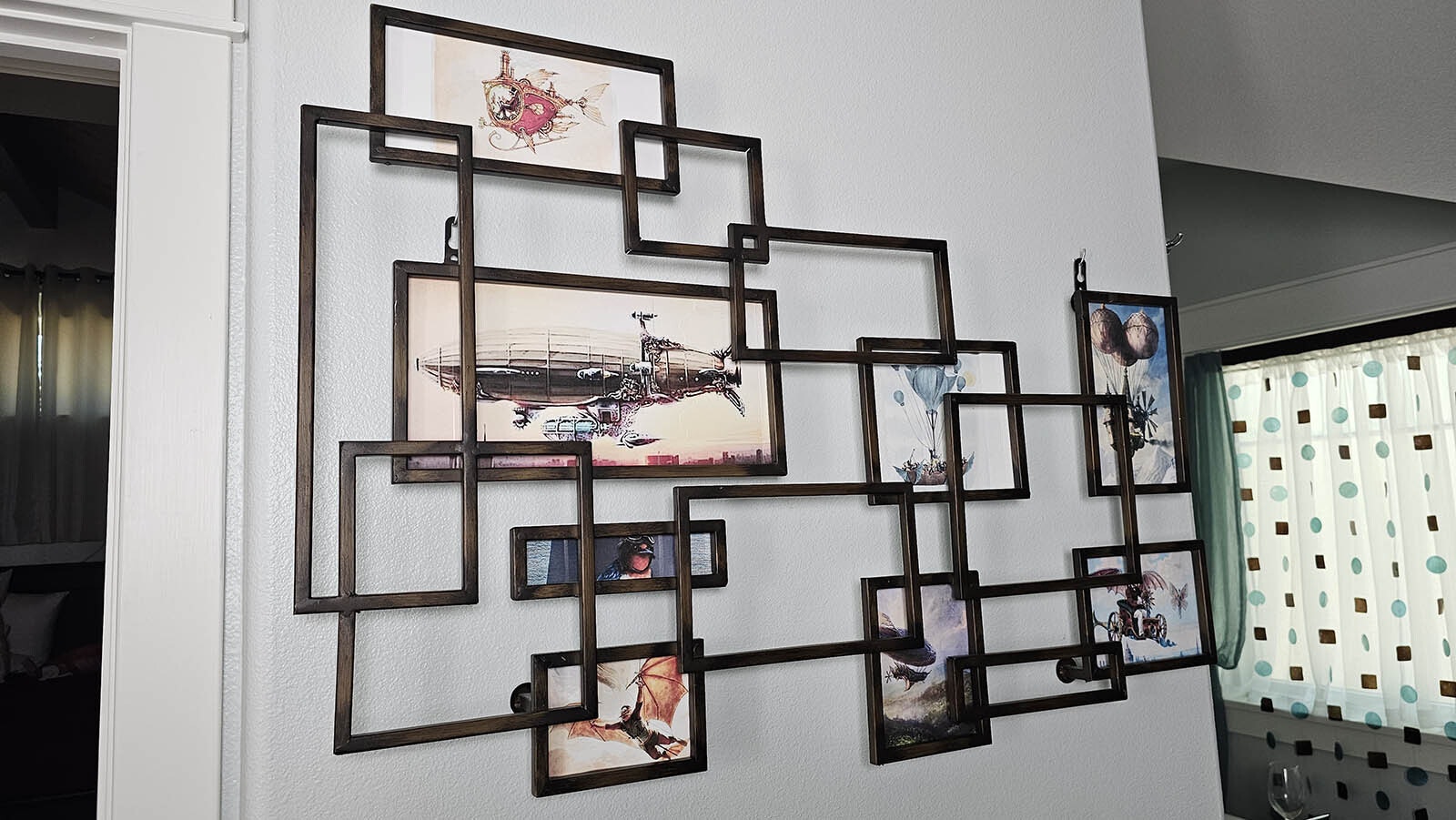 A variety of flying contraptions decorate the walls of the bathroom in the upstairs master bedroom.