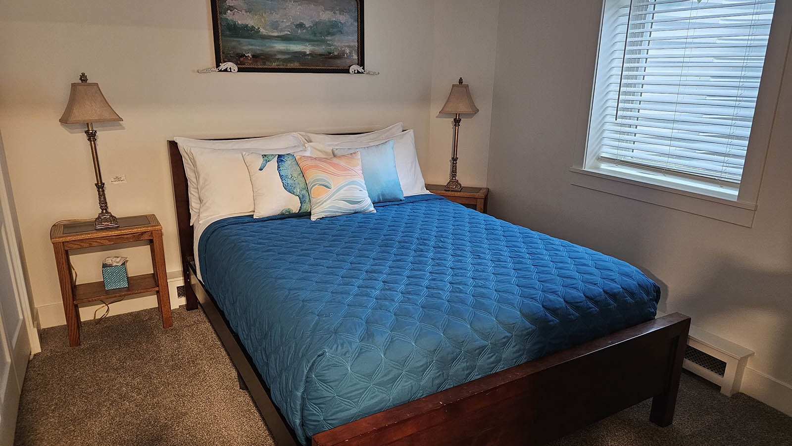 A nautical themed bedroom in the basement.