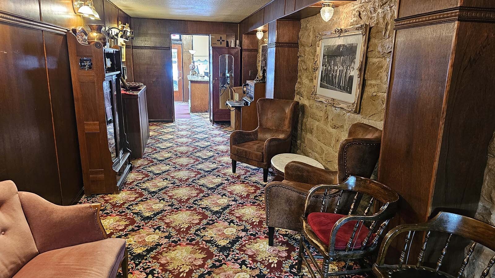 The small lobby leads to a long hallway with several period artifacts, and other memorabilia, including an old switchboard.