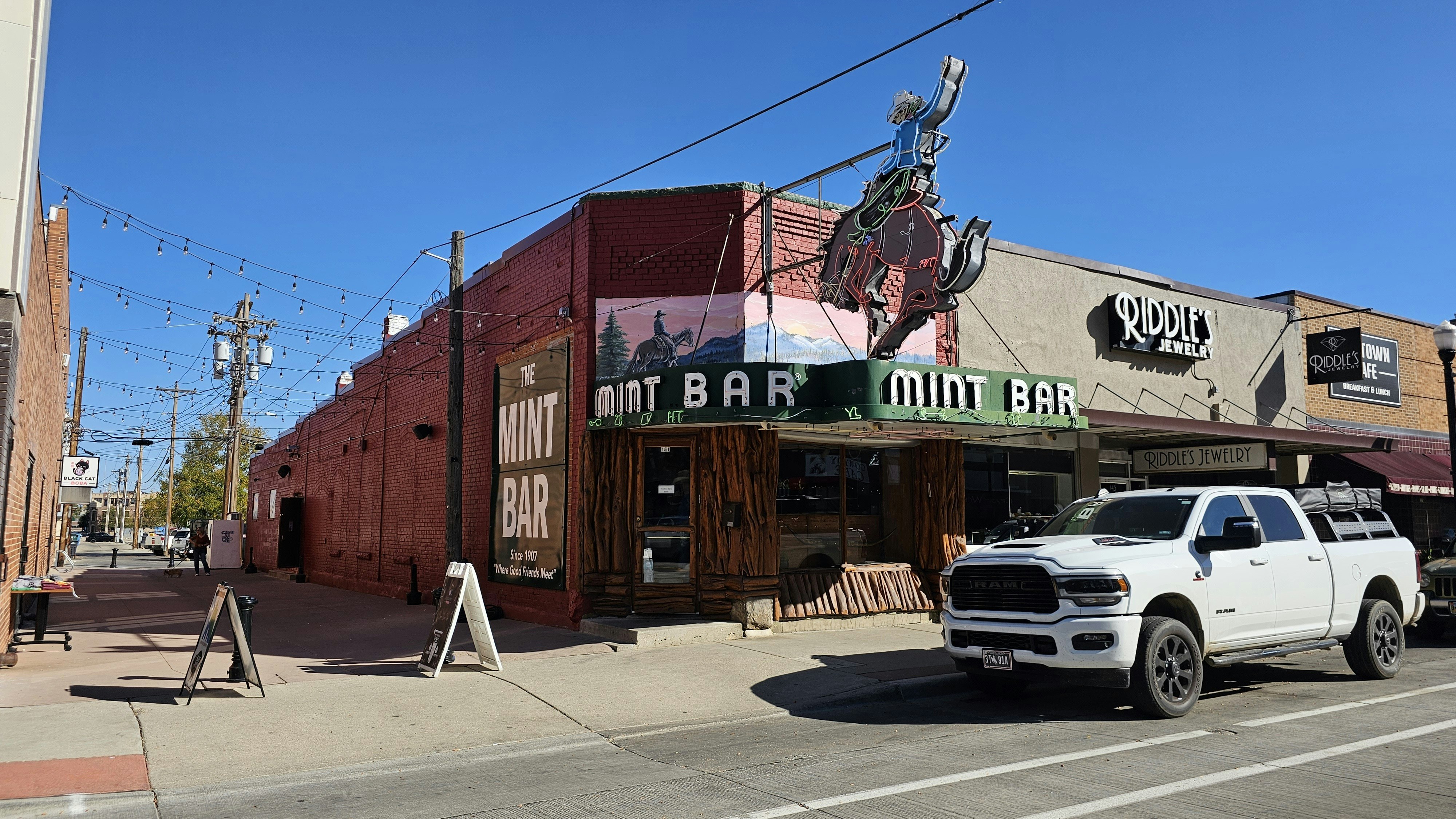 By day, The Mint Bar in Sheridan doesn't attract nearly as much attention as it does at night, when the sign is lit up.