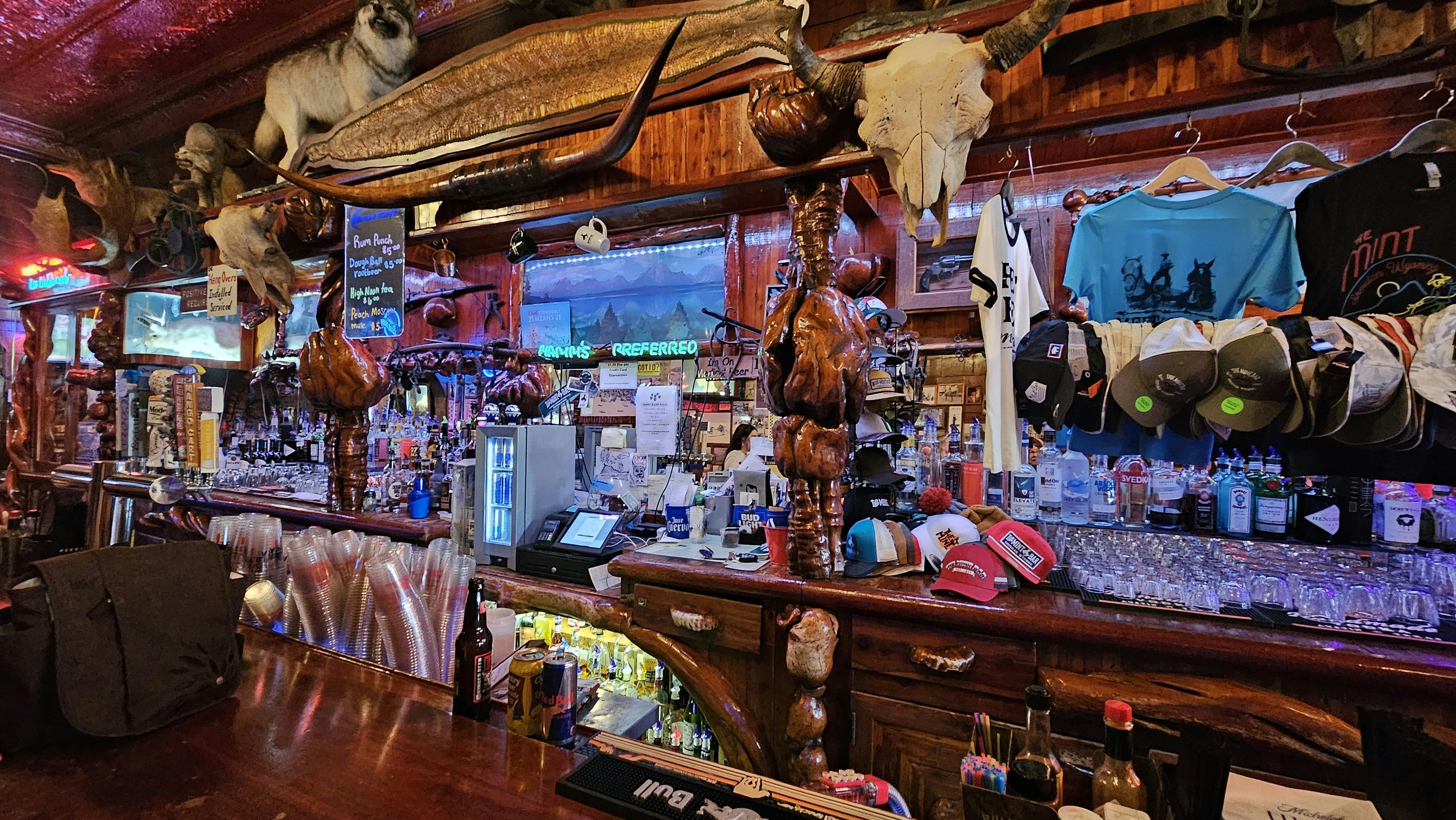 An 8-foot-long snakeskin is among the artifacts that decorate The Mint Bar in Sheridan.