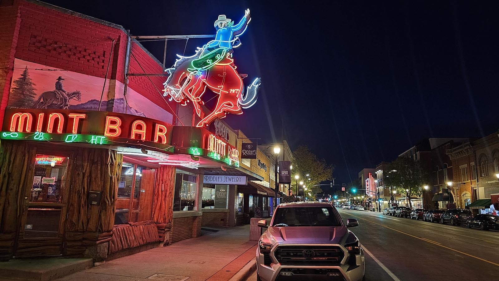 The night sky is the perfect backdrop for The Mint Bar's iconic sign, setting it off like a gemstone in a jewelry box.