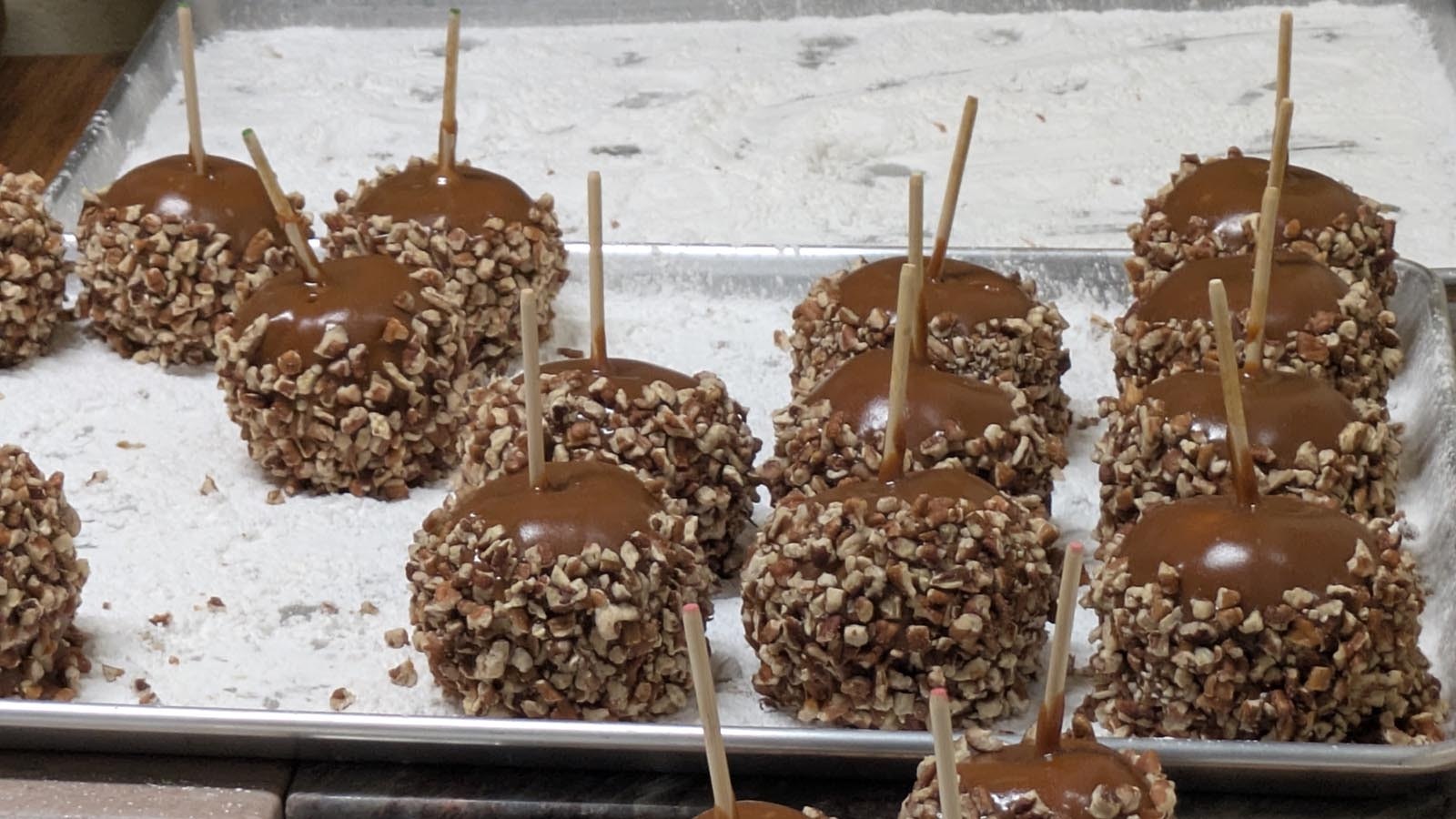 Fall fare at the shop includes giant caramel candied apples.