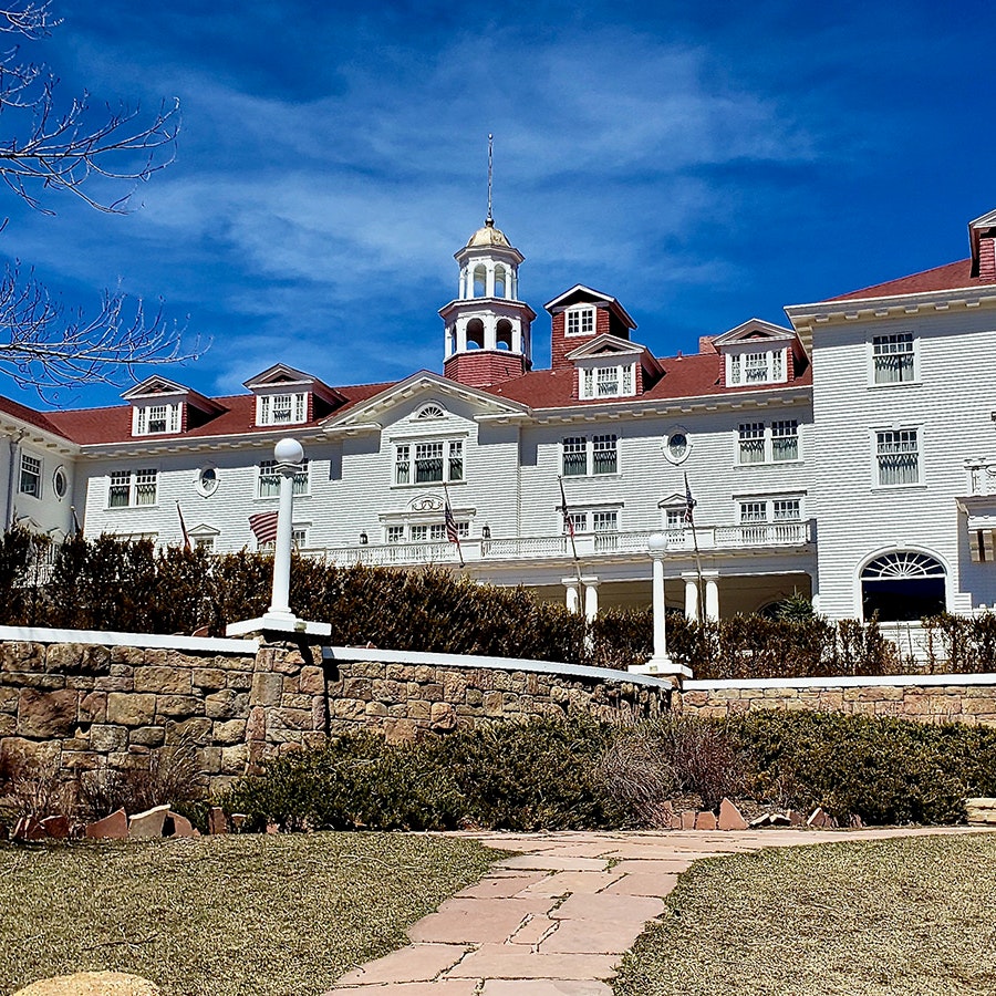 The Stanley Hotel in Estes Park, Colorado, looks like it belongs in a horror film with its Colonial Revival architecture that has a Gothic vibe.