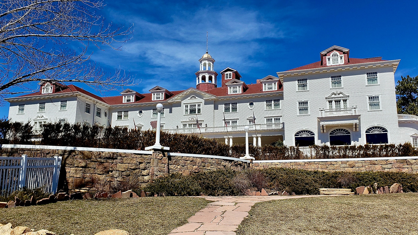 The Stanley Hotel in Estes Park, Colorado, looks like it belongs in a horror film with its Colonial Revival architecture that has a Gothic vibe.