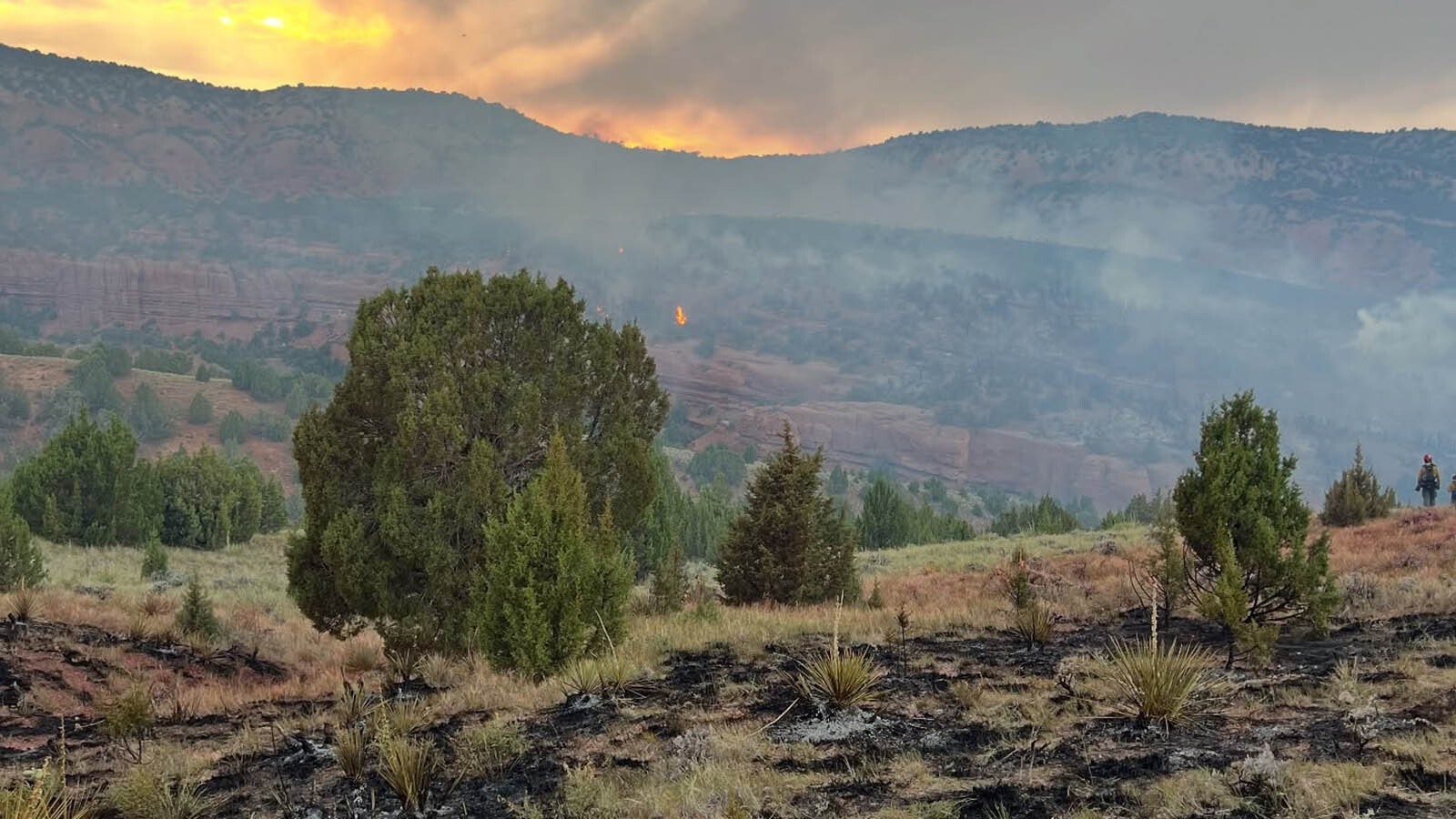 Flames from the Coyote Run Fire south of Thermopolis on Tuesday evening. The Thermopolis Volunteer Fire Department has responded to several fires sparked by lightning on Tuesday, but most were contained or extinguished quickly.