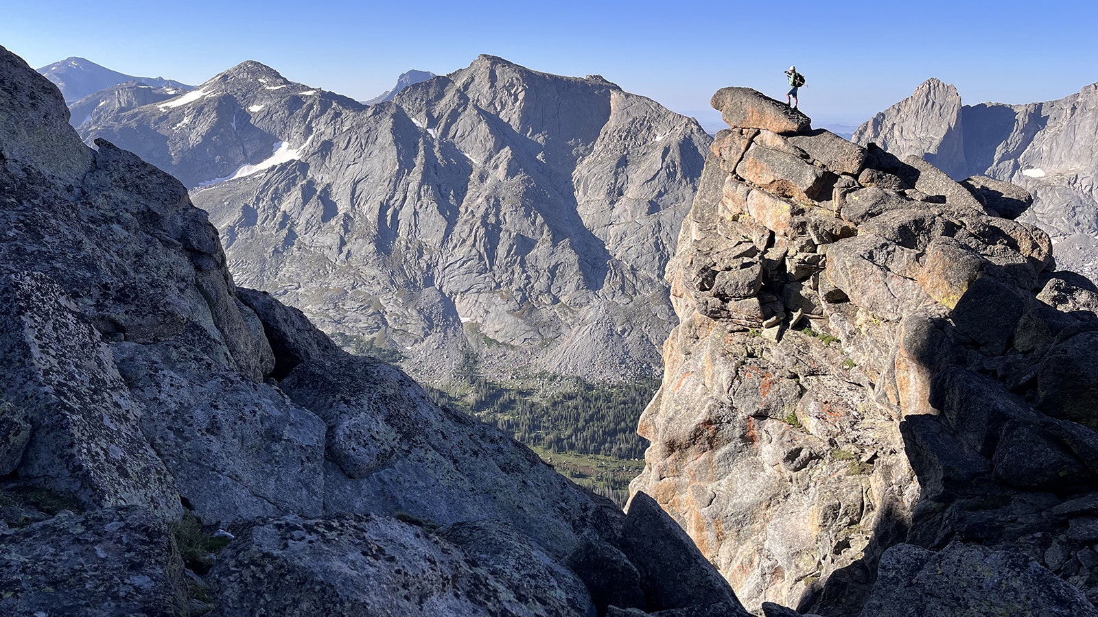 Thomas Turiano's regular partner Alex Lennon climbs a pinnacle on their way up Lizard Head Peak in the Wind Rivers in July 2023. It was Turiano's second to last "Select Peak" to tackle.