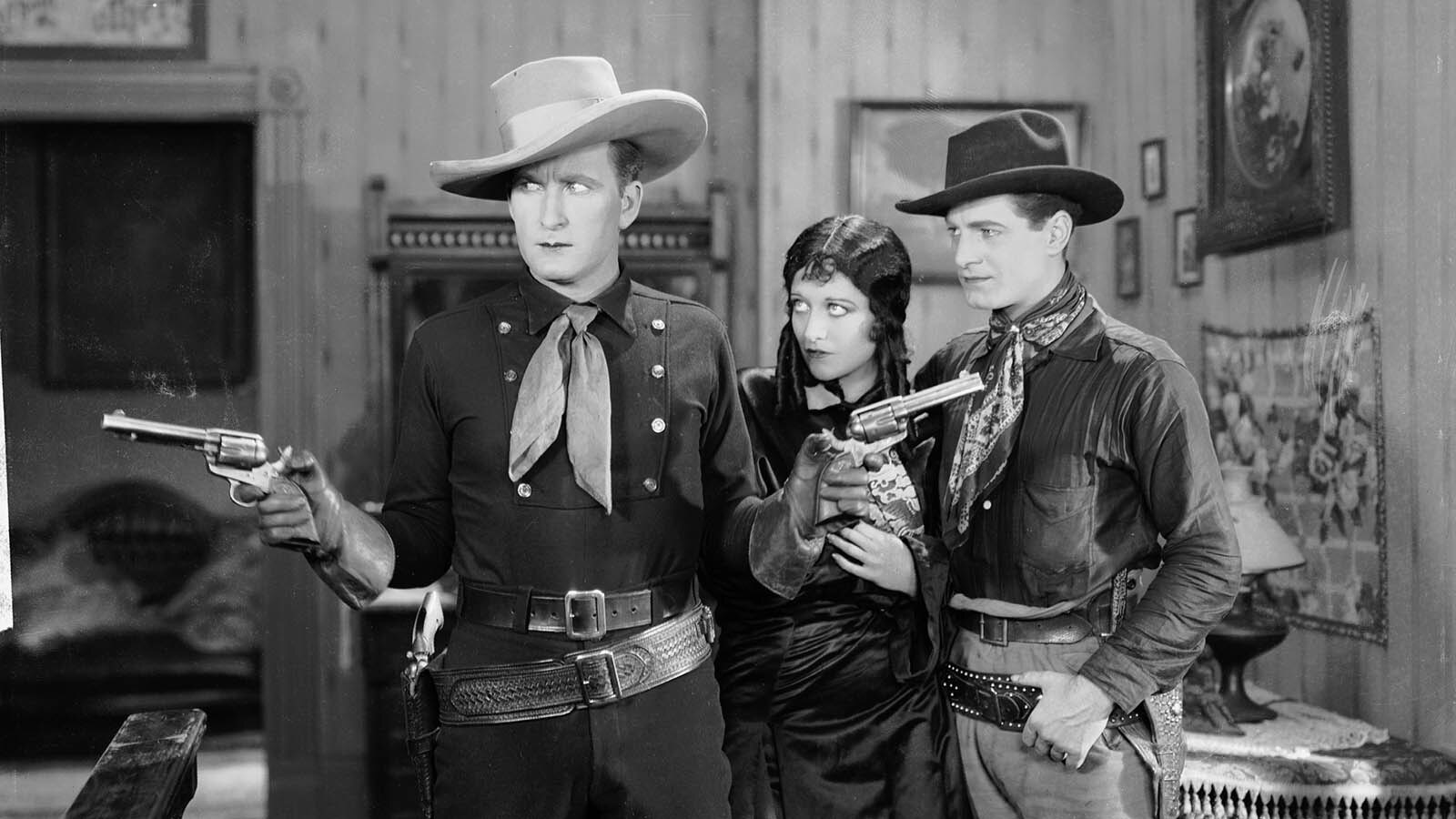 From left, Tim McCoy, Joan Crawford and Rex Lease in "The Law of the Range," directed by William Nigh for MGM in 1927.