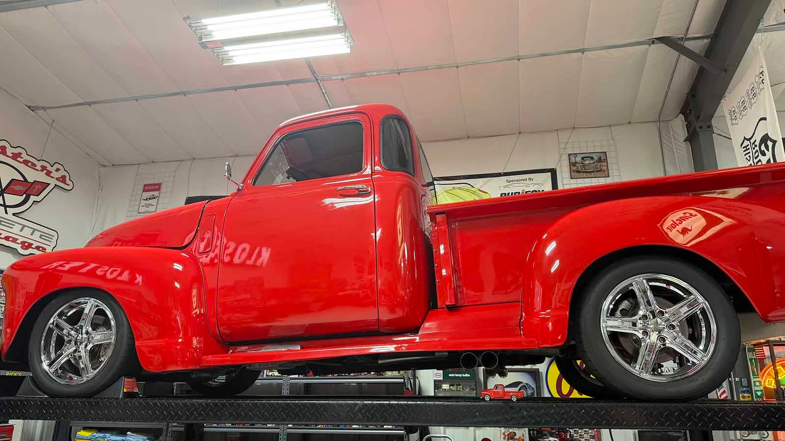 The cherry red 1950 Chevy pickup and its tiny replica in Larry Kloster’s collection are dedicated to the memory of his father, who had the same model while Kloster was growing up. Each vehicle in his collection and their tiny replicas have a special story attached to them.
