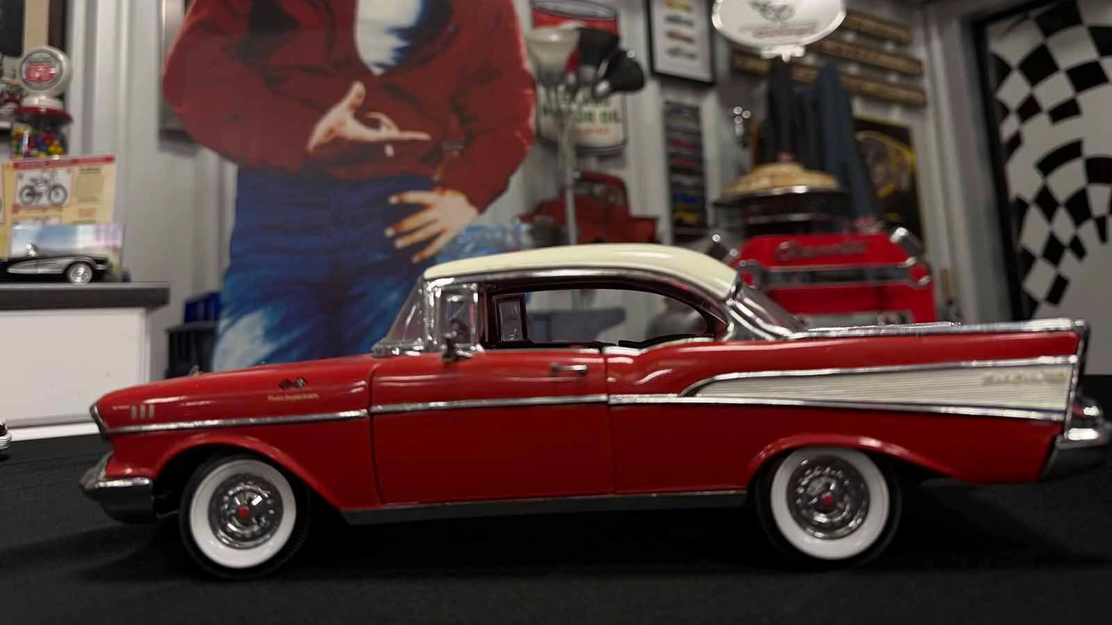 Ed Downes of the Knight Kruisers Car Club of Douglas has both the real deal and replica of a red 1957 Chevy he bought in honor of his grandparents. He started a model car show in Douglas 18 years ago and enjoys creating dioramas to display.