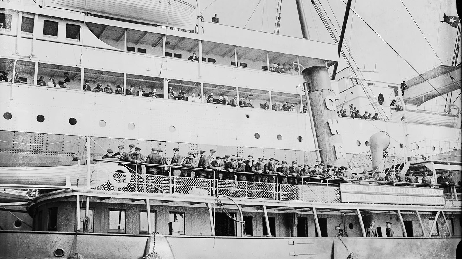Survivors of the Titanic disaster on April 29, 1912, board a Great Western Railway ferry at Plymouth after arriving in England on the SS Lapland.