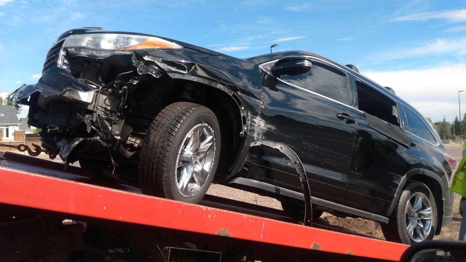 On the way to the hospital, Lynn Hutchings took a photo of the Toyota Highlander her husband Tom was driving.