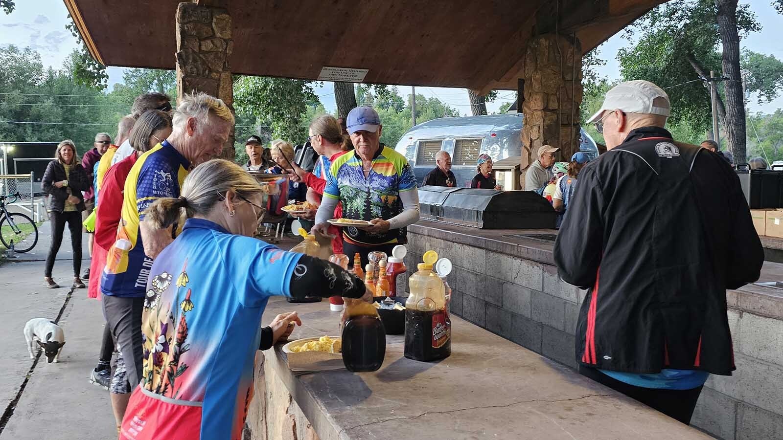 A hearty breakfast fuels up riders with the Tour de Wyoming, which hires a caterer that specializes in serving wildfire fighters each year. Other services for the tour include a barista, a masseuse, a yoga instructor, and a smoothie maker.