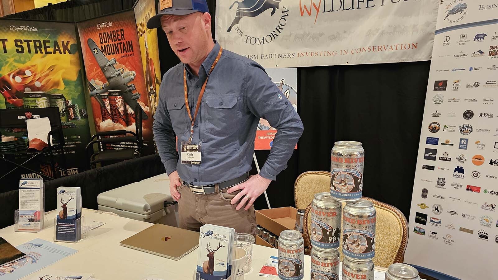 Chris McBarnes at Wyldlife For Tomorrow's booth at the Wyoming Governors Hospitality and Tourism Conference.