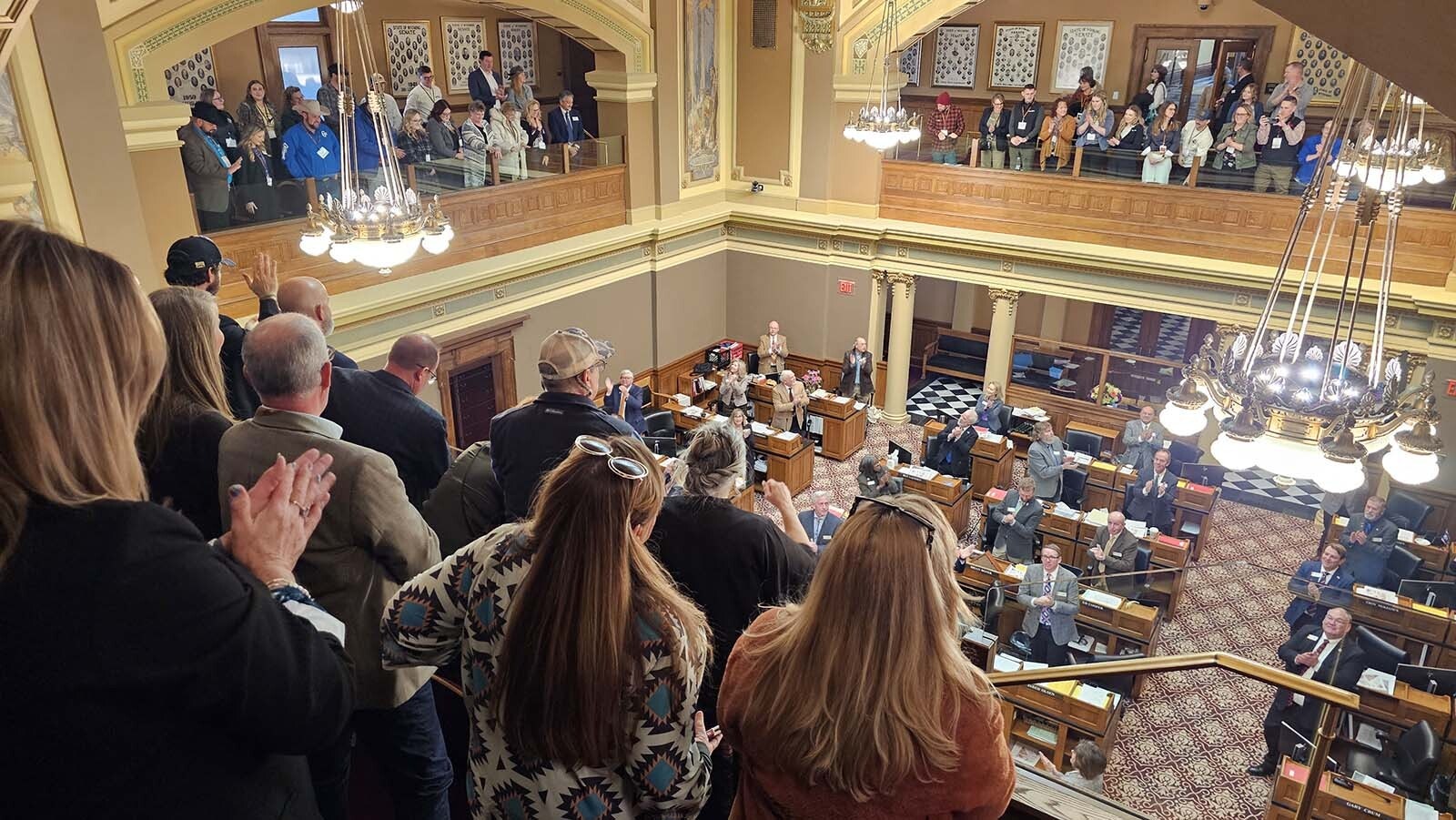 The Wyoming Hospitality and Travel Coalition is introduced in the state Senate on Monday, where all four balconies were stacked with people representing Wyoming's tourism industry.