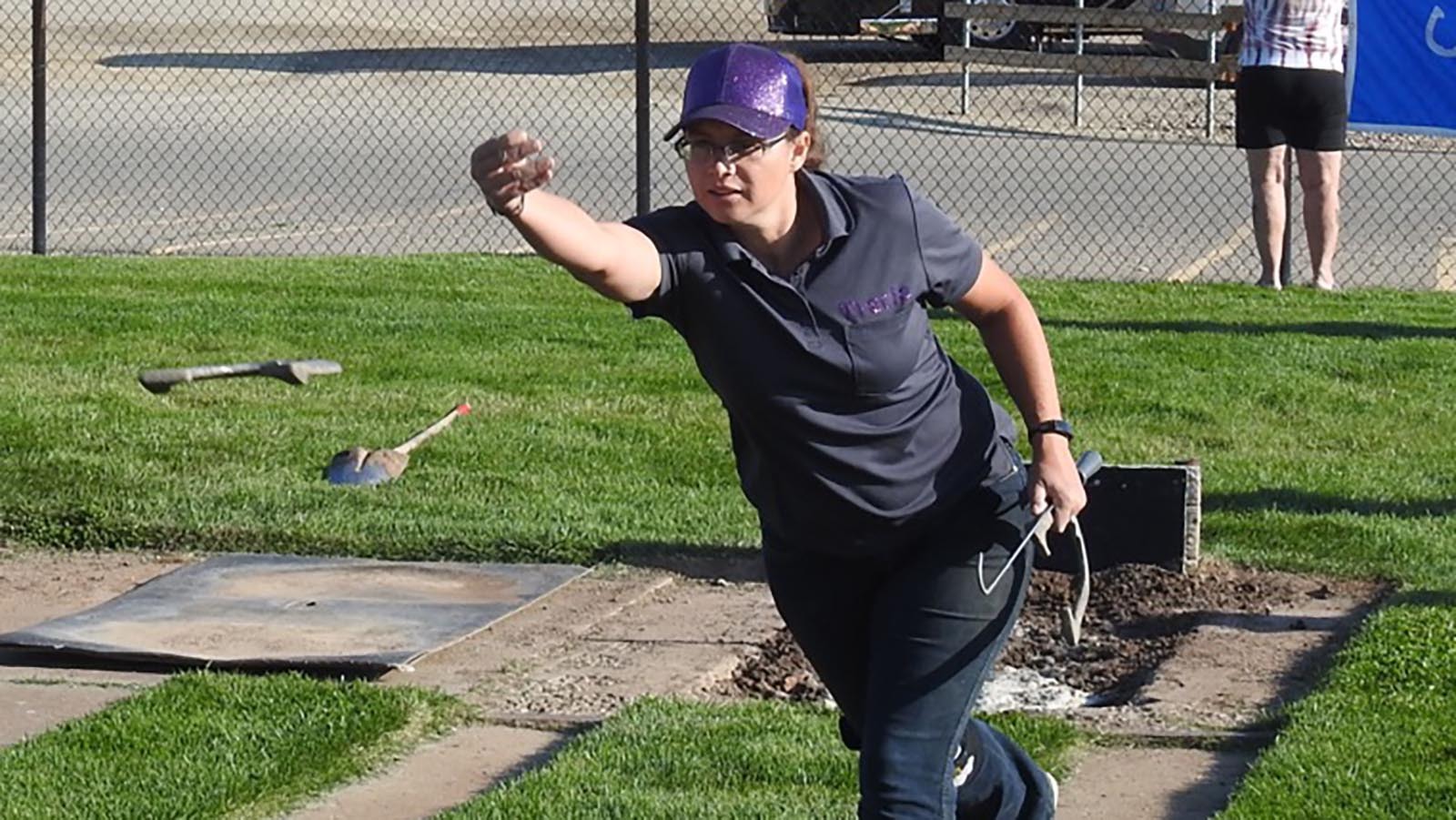 Focus can make a big difference in horseshoes. Tracie Binkerd warms up during the 2021 State Horseshoe Tournament.