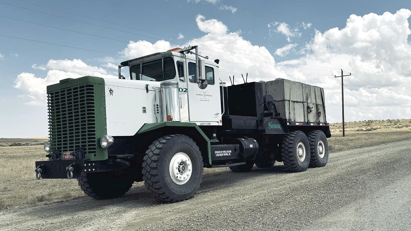 One of the six 1,000-horsepower trucks used to pull and push a 1.5 million-pound trailer carrying a transformer to PacifiCorp’s Aeolus substation.