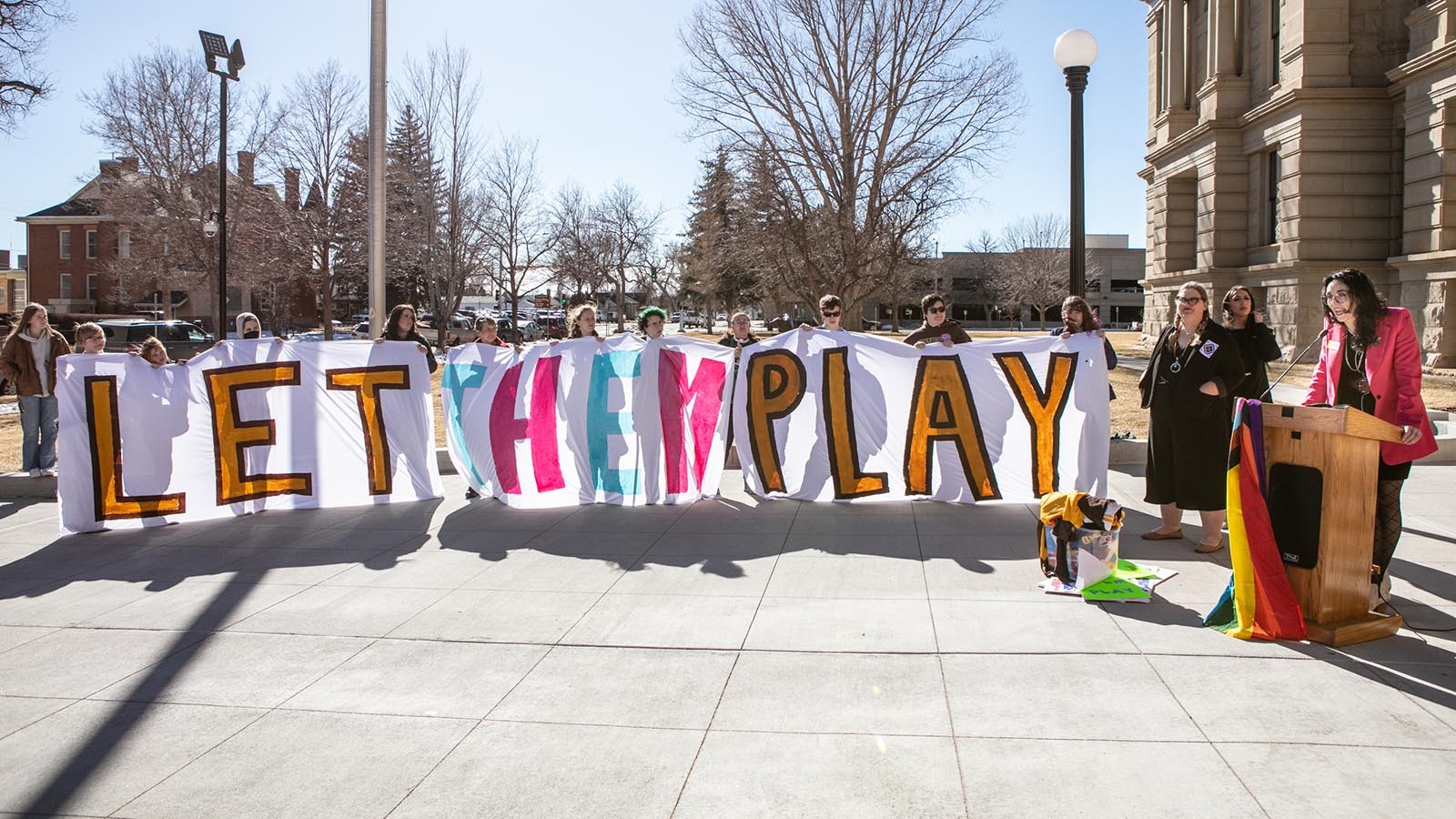 State Rep. Karlee Provenza, D-Laramie, far right, during a protest at the Wyoming State Capitol in March of the recently passed tudent Eligibility in Interscholastic Sports bill, which bans transgender girls from participating in girls' sports.