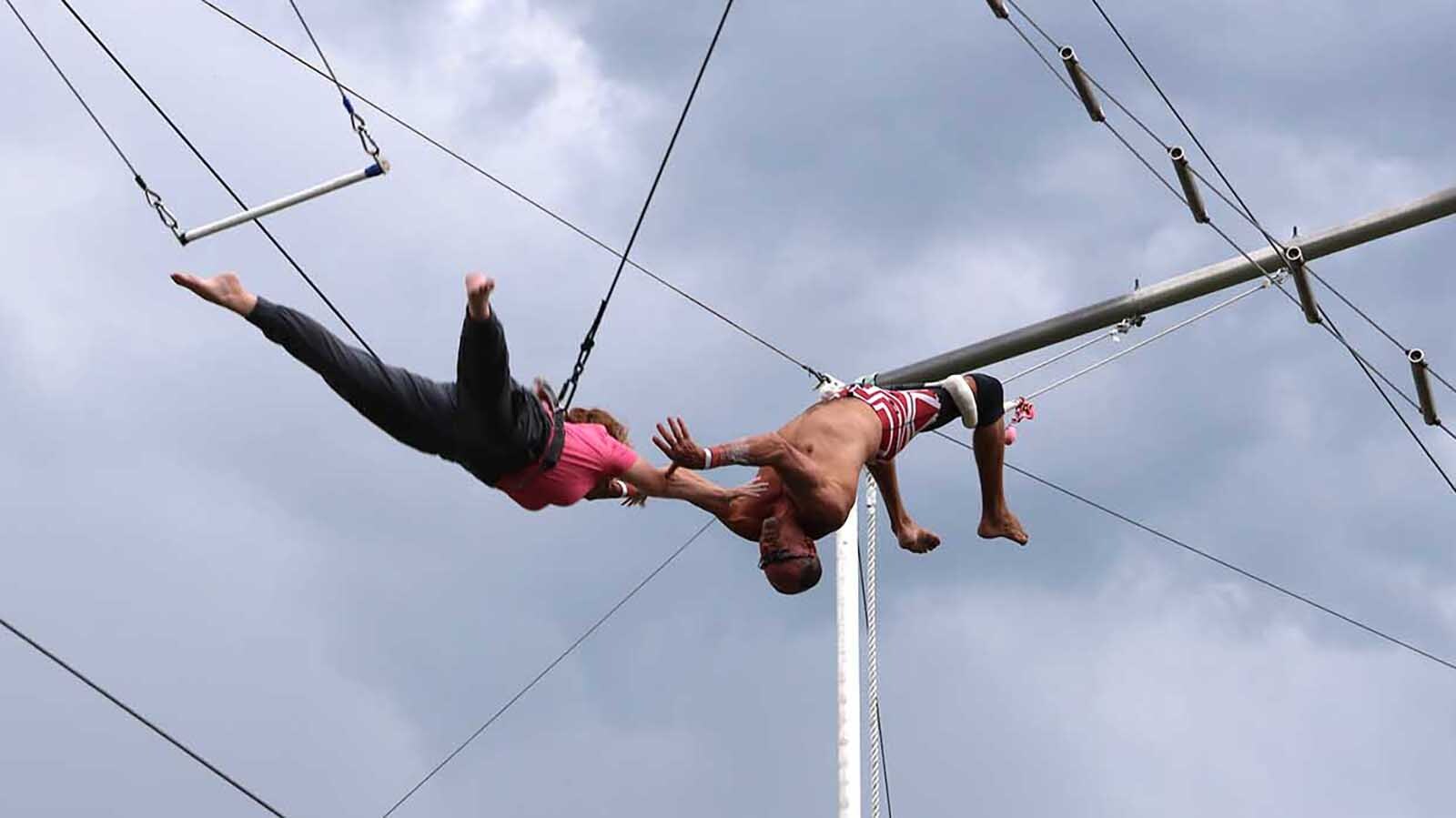 Valerie Hovland just misses a connection with Steve Tobi in a practice session. She was wearing a safety line.