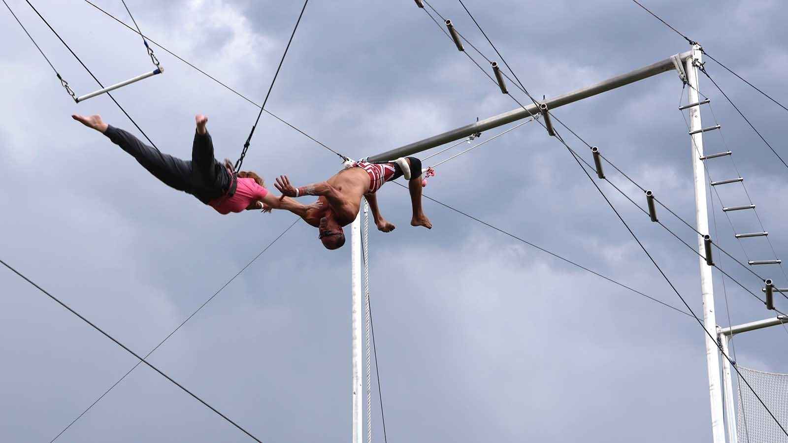 Valerie Hovland just misses a connection with Steve Tobi in a practice session. She was wearing a safety line.