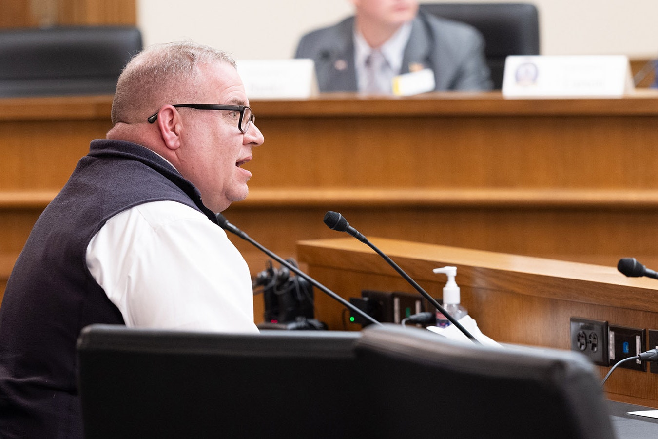 Wyoming Mining Association Director Travis Deti testifies against a budget amendment that strips $347 million from the state's Energy Matching Fund program.