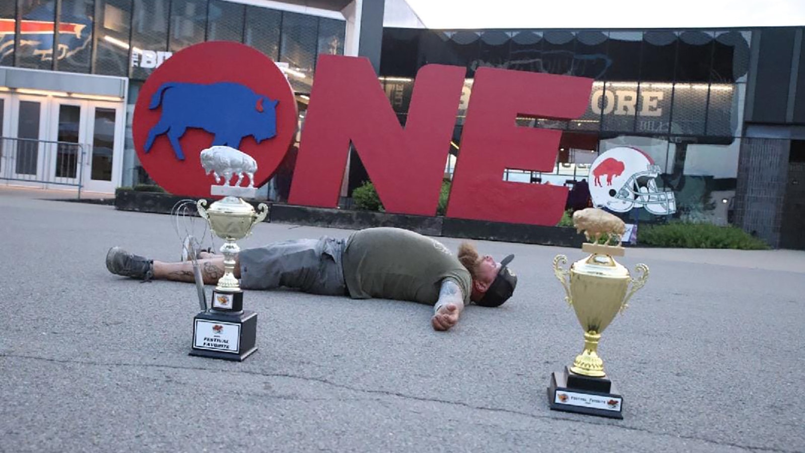 Weitzels Wings owner and founder Trent Weitzel with his back-to-back Festival Favorite trophies for 2022 and 2023 at the National Buffalo Wing Festival in Buffalo, New York.