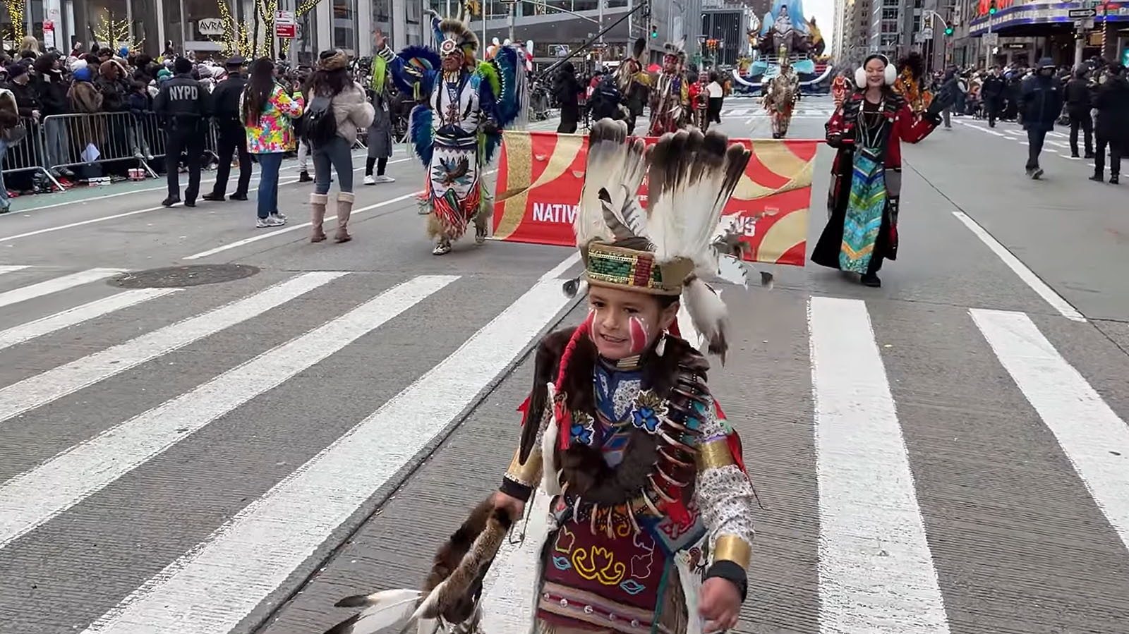 George Abeyta and his 6-year-old grandson Ethanial Brown (aka Baby E) from Wyoming's Wind River Indian Reservation showcased their Shoshone heritage at the Macy’s Thanksgiving Day Parade in New York on Thursday.