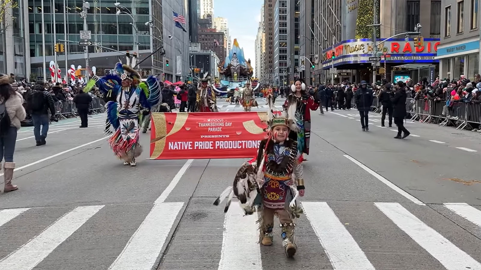 George Abeyta and his 6-year-old grandson Ethanial Brown (aka Baby E) from Wyoming's Wind River Indian Reservation showcased their Shoshone heritage at the Macy’s Thanksgiving Day Parade in New York on Thursday.