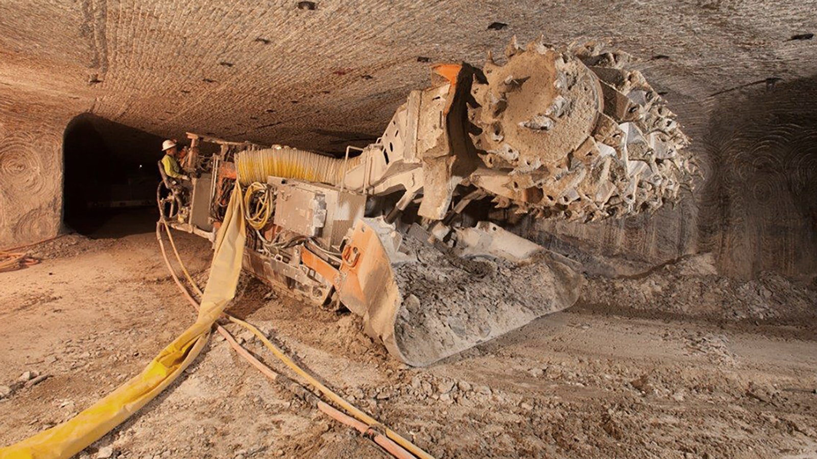 Trona is mined underground using heavy equipment like this continuous miner. The ore is then carried to the surface and processed.