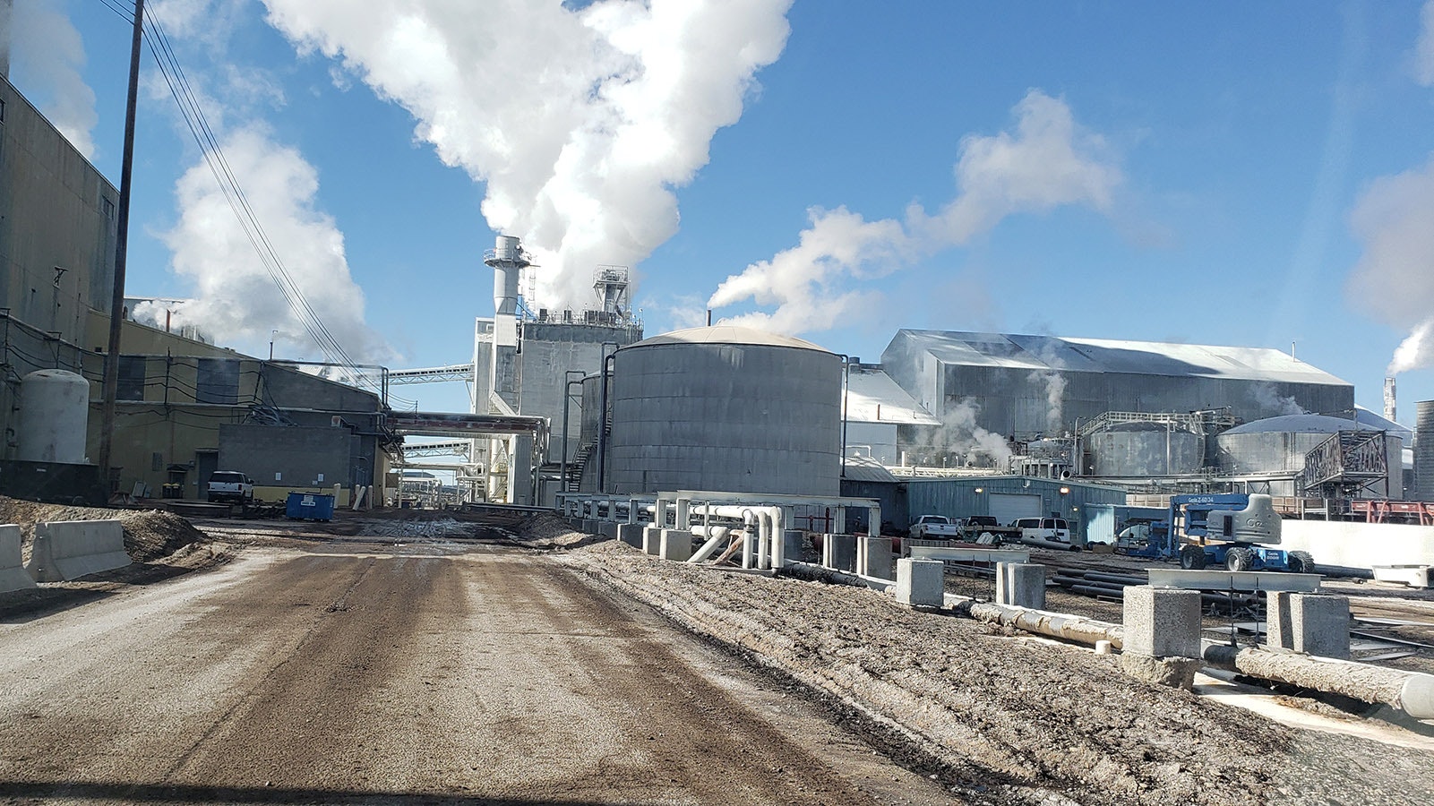 Above ground, Genesis Alkali has several processing facilities. The plumes of white are steam, not smoke.