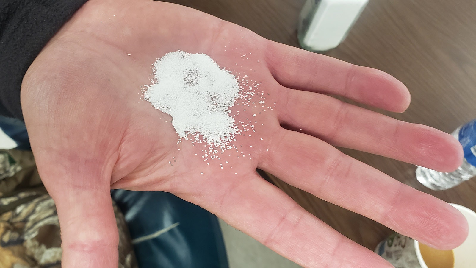 Soda ash can be made in several grades. This one that looks like grains of sand is used for glass-making.