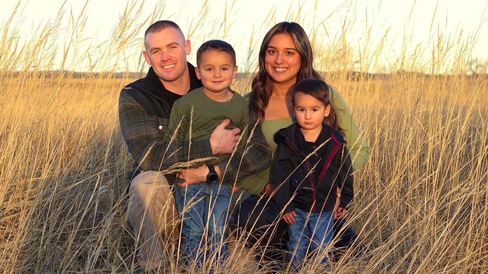 Wyoming Highway Patrol Trooper Parker Smith with his wife, Aby, and 4-year-old son PJ, and 2-year-old son Christian.