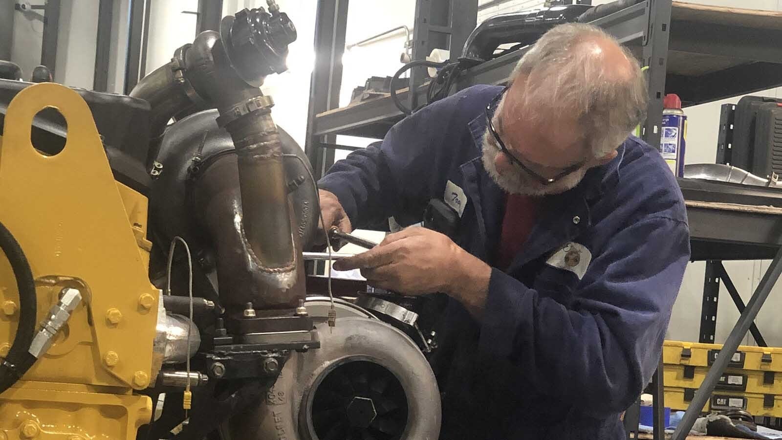 A 65-year-old Wyoming man is in federal prison from pulling EPA-mandated emissions systems from ailing diesel engines. As the Trump administration inches toward reversing those mandates, Troy Lake's family is pushing for the president to pardon him.