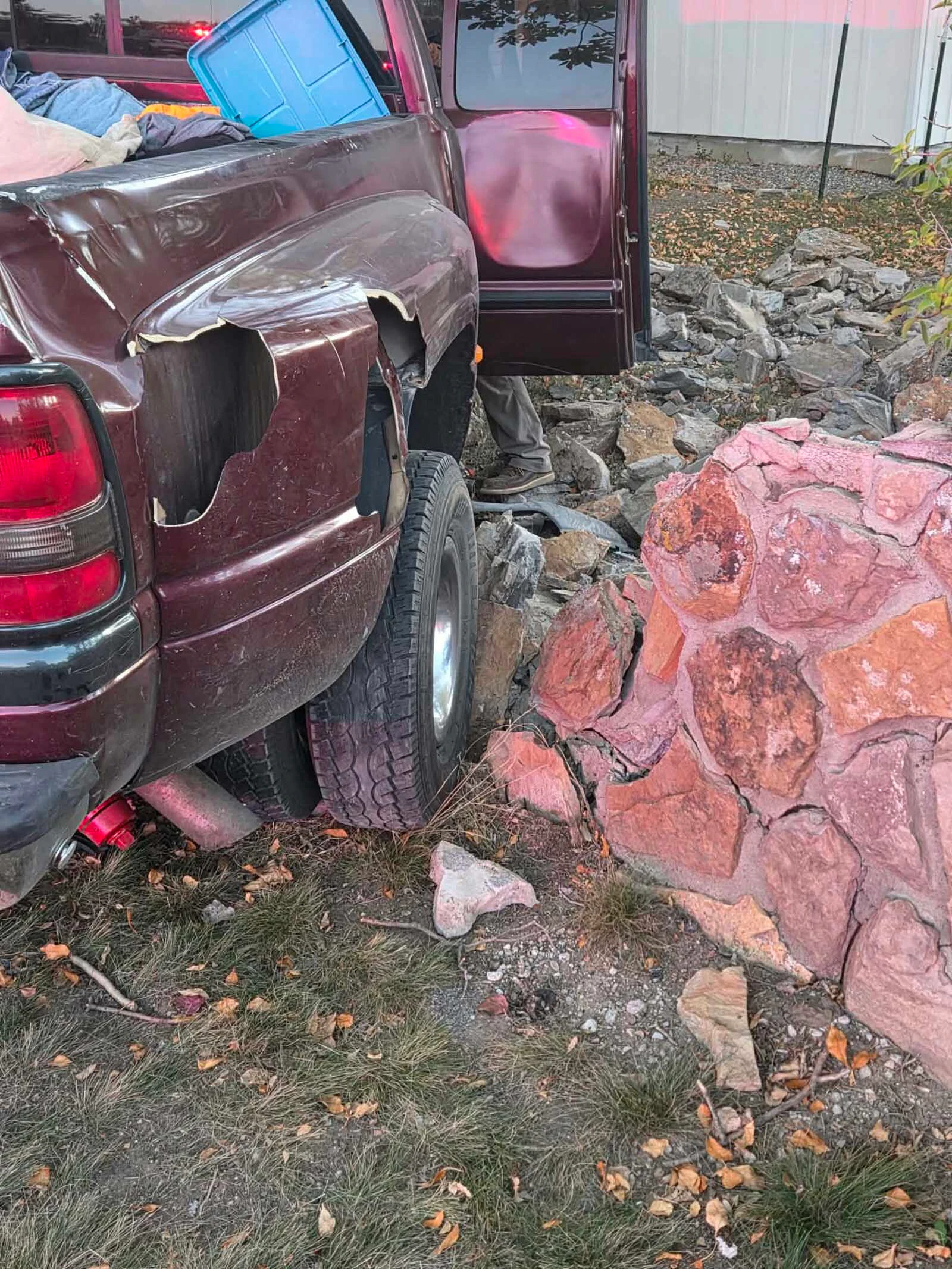 The pickup sustained significant damage after plowing through the heavy stone wall surrounding Christina Wright’s Gillette property Tuesday. Large sections of the wall were knocked apart and scattered across the yard.